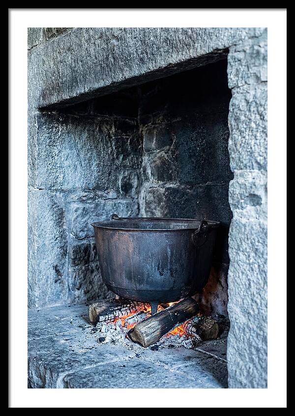 Vintage Iron Cauldron In Fireplace