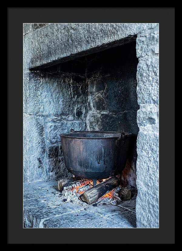 Vintage Iron Cauldron In Fireplace