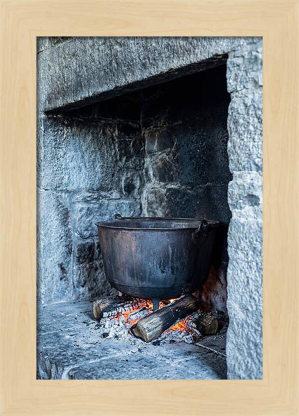 Vintage Iron Cauldron In Fireplace