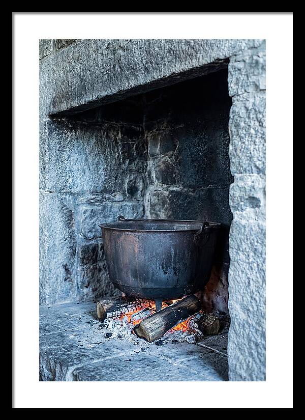 Vintage Iron Cauldron In Fireplace