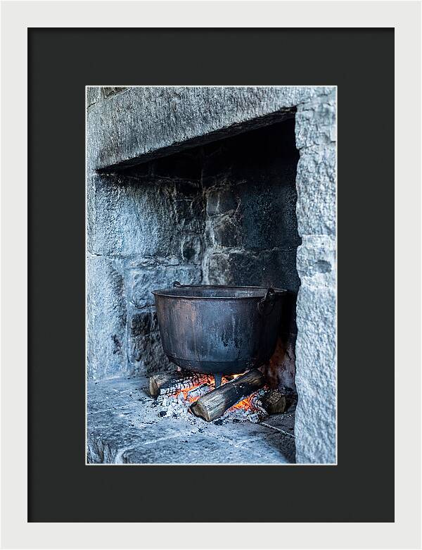Vintage Iron Cauldron In Fireplace