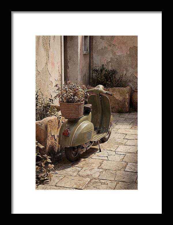 Vintage Vespa Scooter With Flowers
