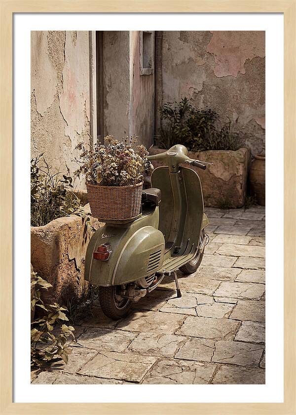 Vintage Vespa Scooter With Flowers
