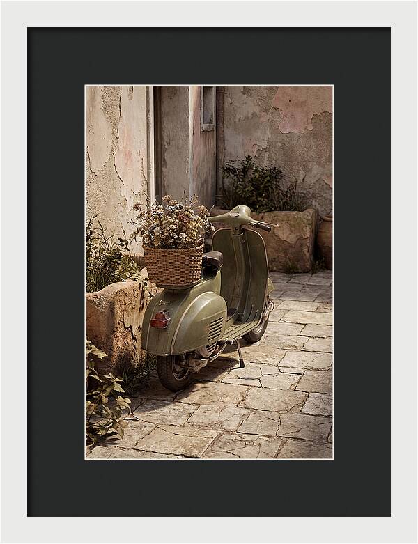 Vintage Vespa Scooter With Flowers