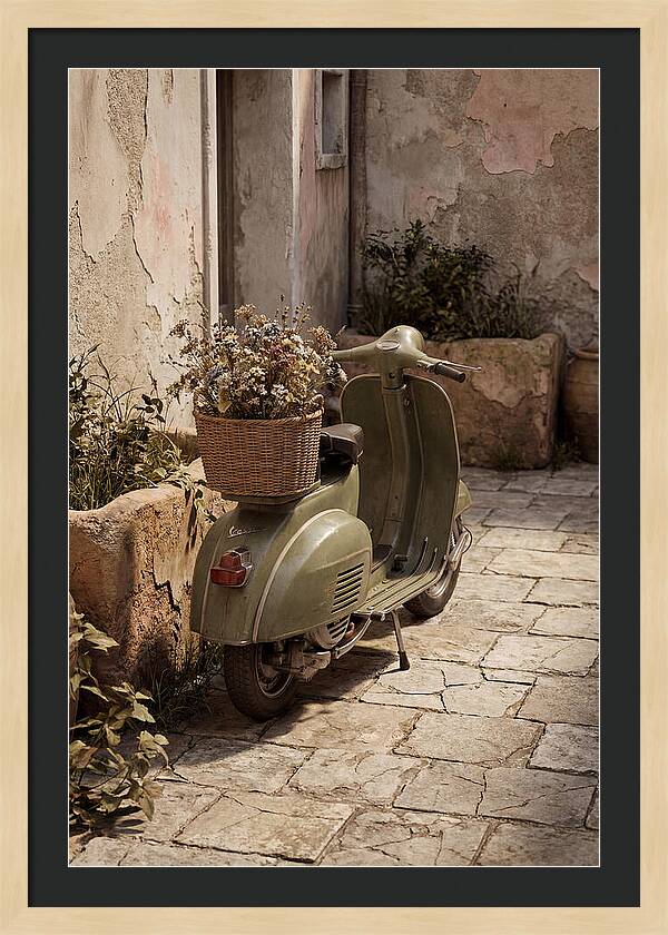 Vintage Vespa Scooter With Flowers