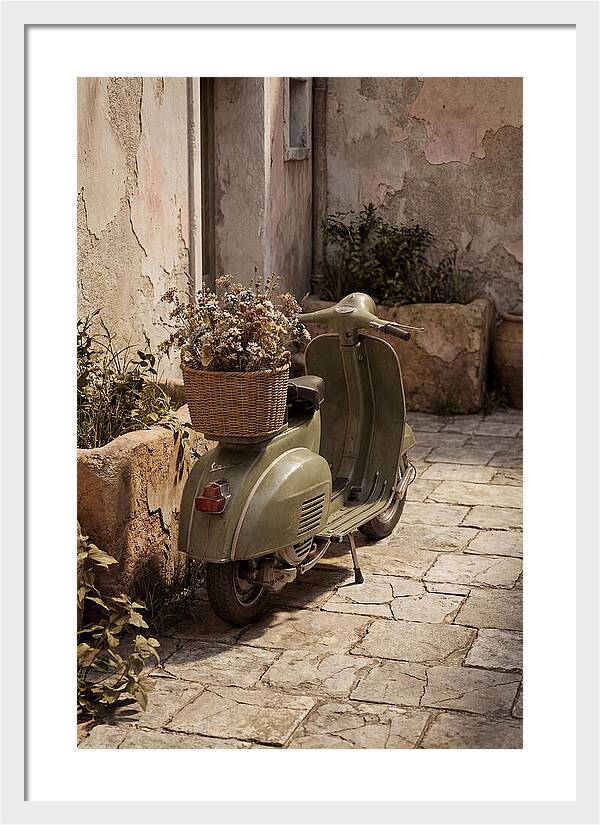 Vintage Vespa Scooter With Flowers