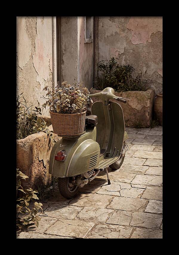 Vintage Vespa Scooter With Flowers