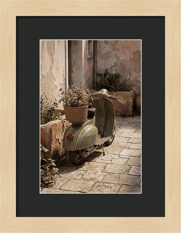 Vintage Vespa Scooter With Flowers