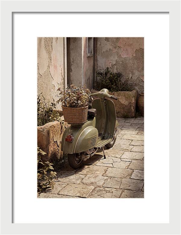 Vintage Vespa Scooter With Flowers