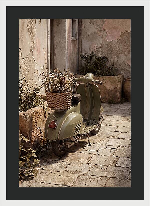 Vintage Vespa Scooter With Flowers