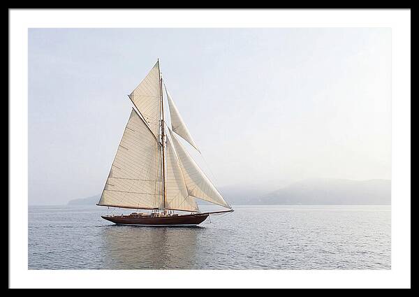 Vintage Wooden Sailboat Under Full Sail