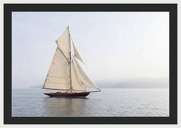 Vintage Wooden Sailboat Under Full Sail