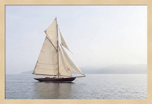 Vintage Wooden Sailboat Under Full Sail
