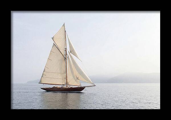 Vintage Wooden Sailboat Under Full Sail