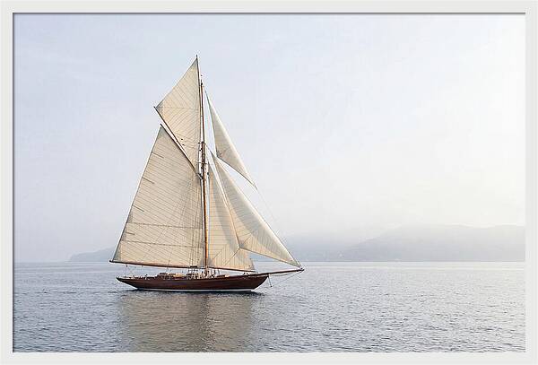 Vintage Wooden Sailboat Under Full Sail