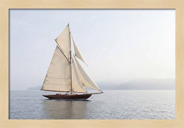 Vintage Wooden Sailboat Under Full Sail