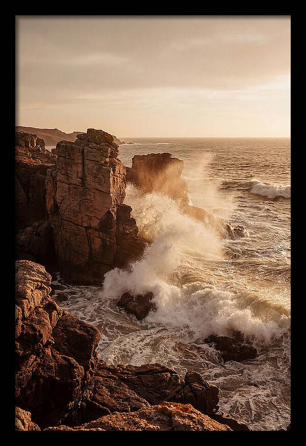 Waves Crashing Against Ancient Stone