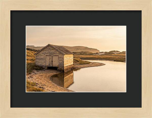 Weathered Boathouse Beside Inlet