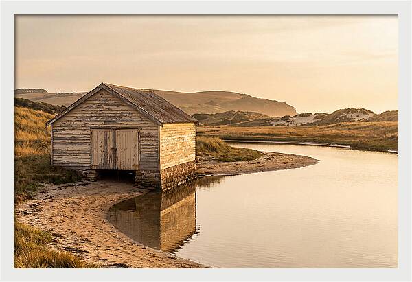 Weathered Boathouse Beside Inlet