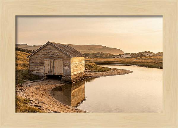 Weathered Boathouse Beside Inlet