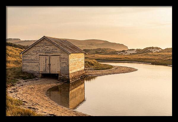 Weathered Boathouse Beside Inlet
