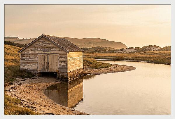 Weathered Boathouse Beside Inlet