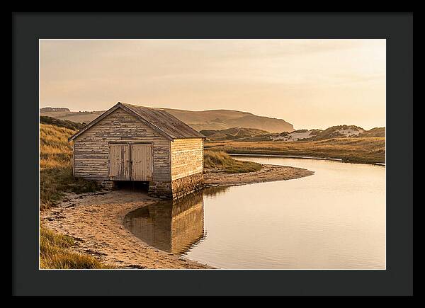 Weathered Boathouse Beside Inlet