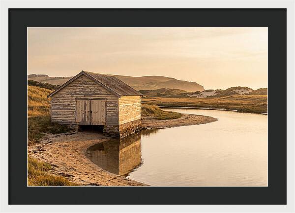 Weathered Boathouse Beside Inlet