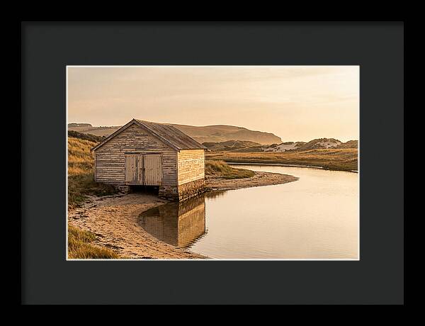 Weathered Boathouse Beside Inlet
