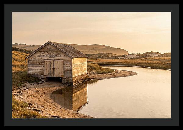 Weathered Boathouse Beside Inlet