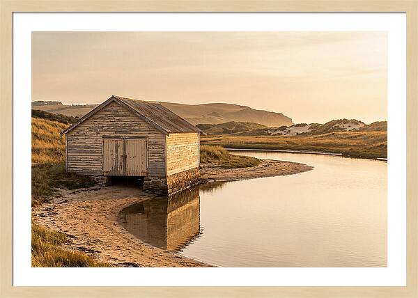 Weathered Boathouse Beside Inlet