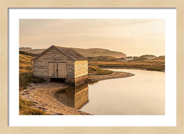 Weathered Boathouse Beside Inlet