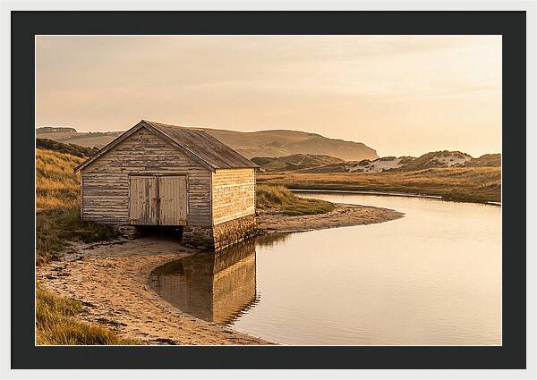 Weathered Boathouse Beside Inlet