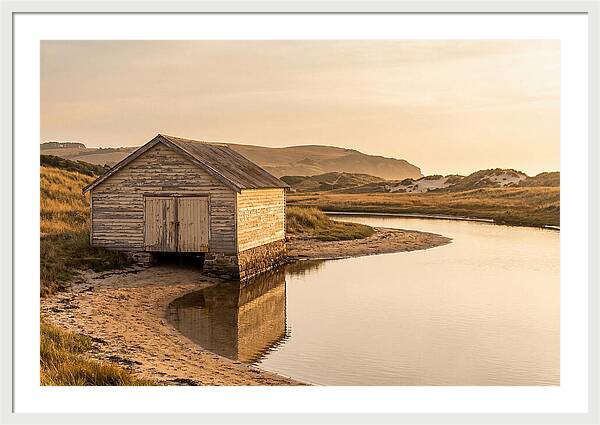Weathered Boathouse Beside Inlet