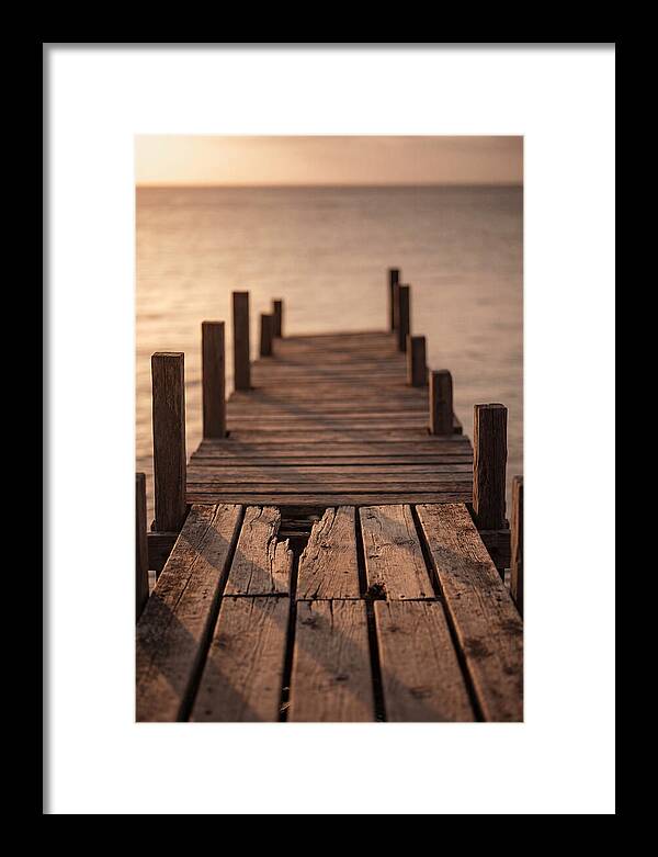 Weathered Wooden Pier At Sunset