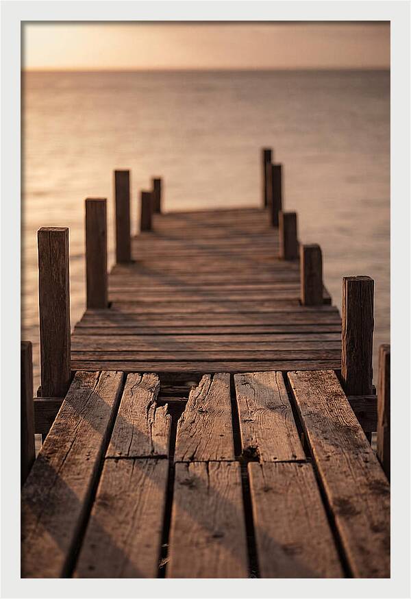 Weathered Wooden Pier At Sunset