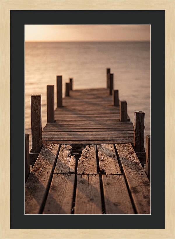 Weathered Wooden Pier At Sunset