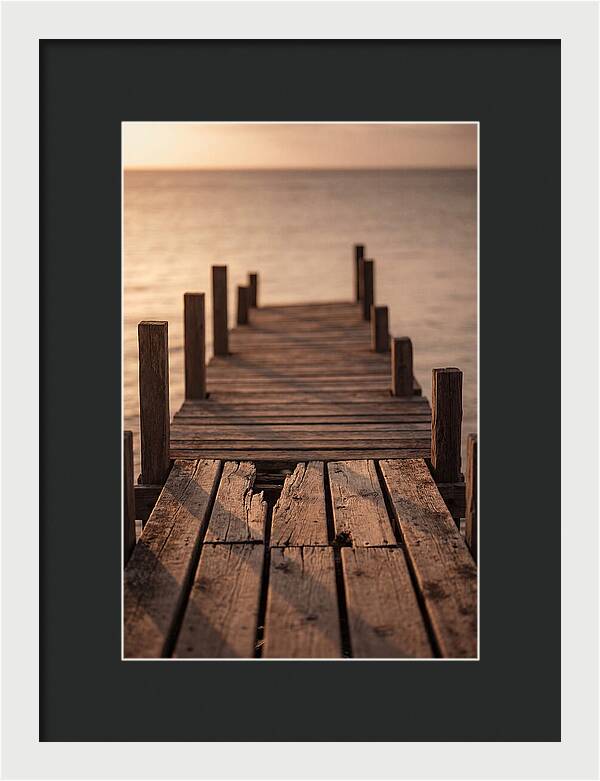 Weathered Wooden Pier At Sunset