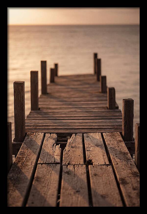 Weathered Wooden Pier At Sunset