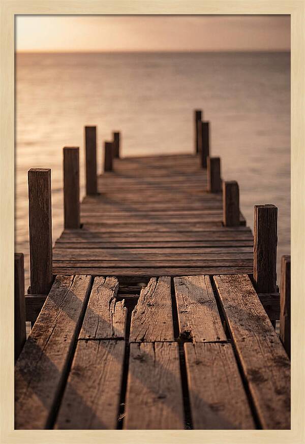 Weathered Wooden Pier At Sunset