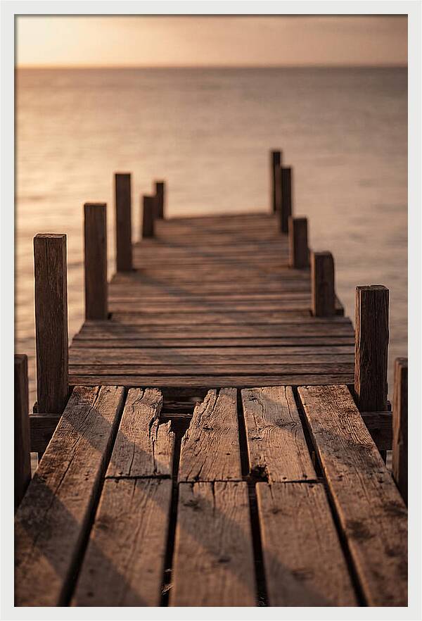 Weathered Wooden Pier At Sunset