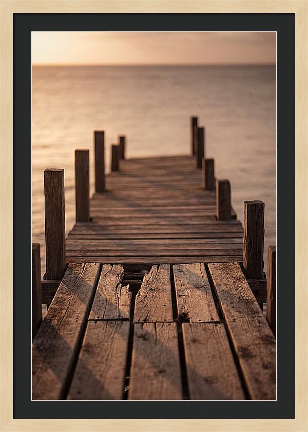 Weathered Wooden Pier At Sunset