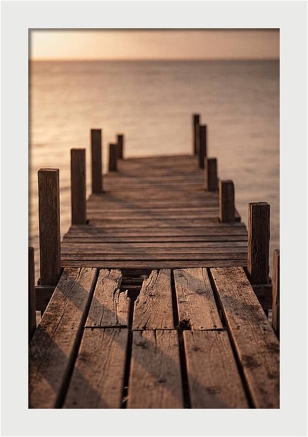 Weathered Wooden Pier At Sunset