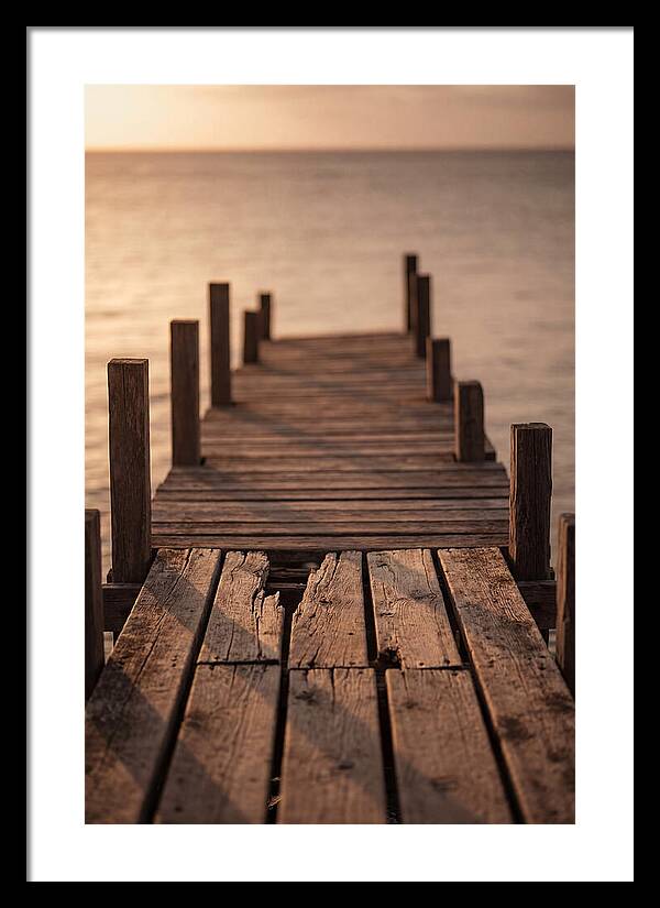 Weathered Wooden Pier At Sunset