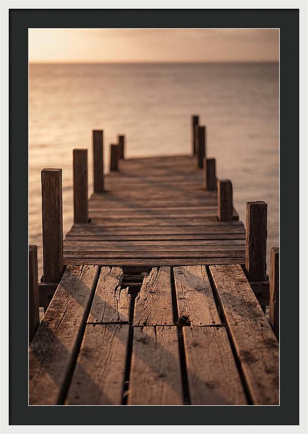 Weathered Wooden Pier At Sunset