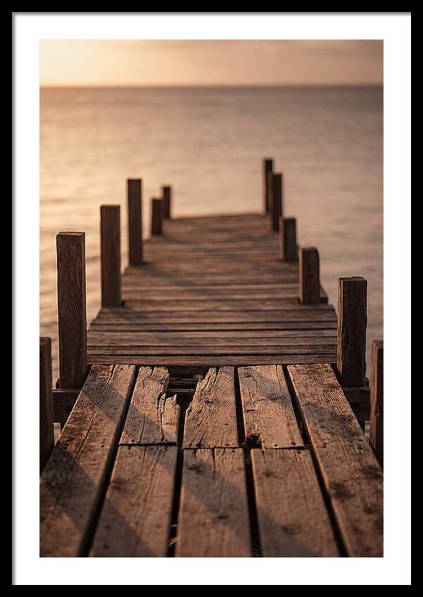 Weathered Wooden Pier At Sunset