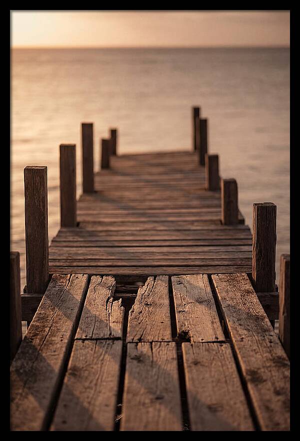 Weathered Wooden Pier At Sunset