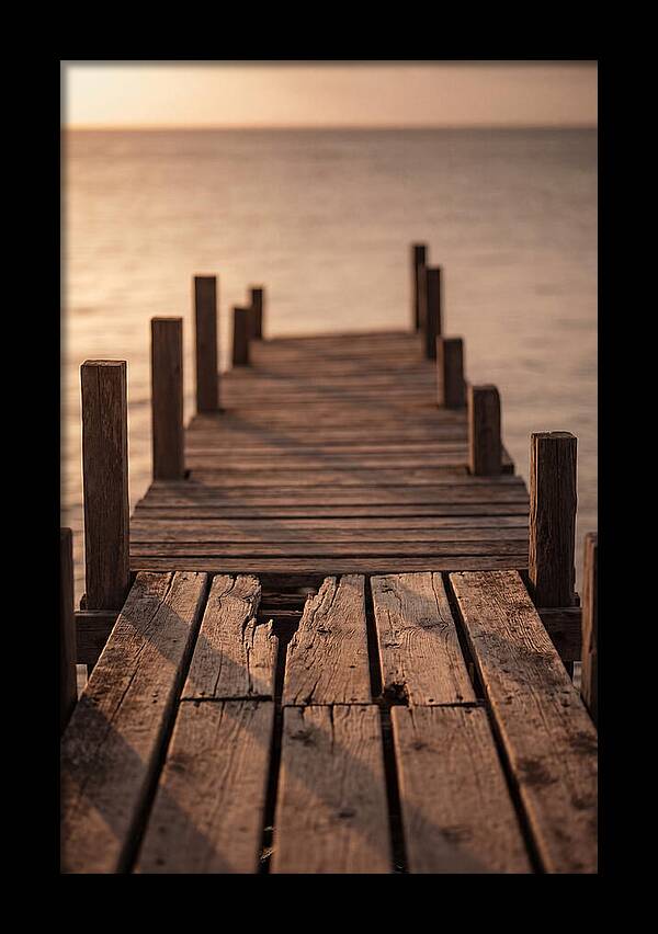 Weathered Wooden Pier At Sunset
