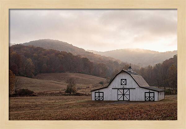 White Barn Against Autumn Landscape