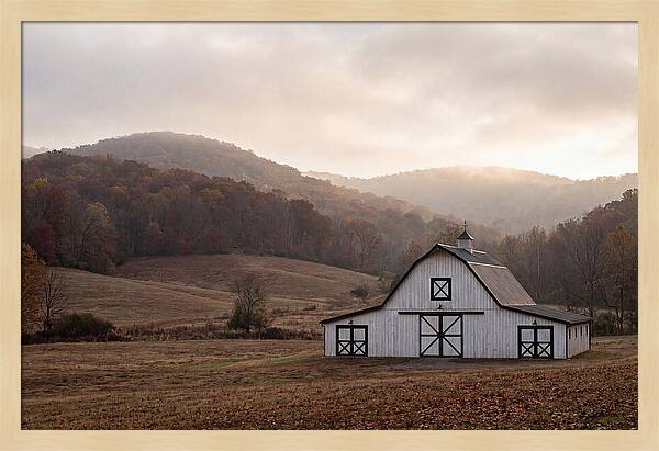 White Barn Against Autumn Landscape
